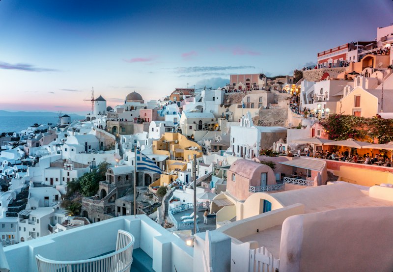 Traveller enjoying the view in Santorini