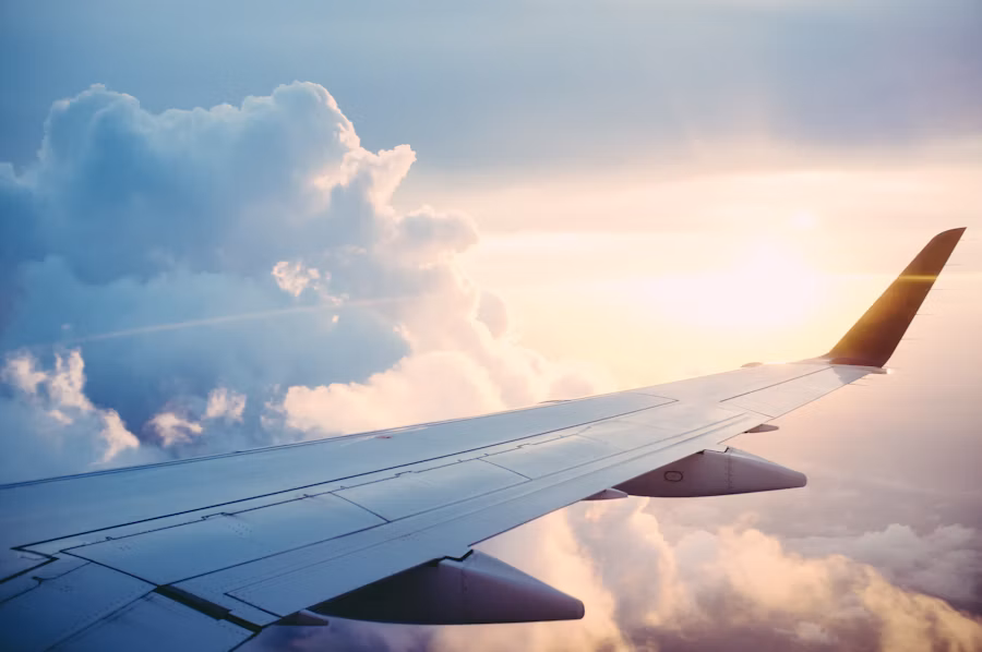 Aeroplane flying above the clouds